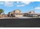 Well-maintained home with desert landscaping, three-car garage, and beautiful desert landscaping at 2684 Korea Ct, Henderson, NV 89052