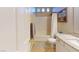Bright bathroom featuring a shower-tub combination and granite countertop vanity at 2713 Tanagrine Dr, North Las Vegas, NV 89084