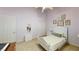 Charming bedroom features soft lavender walls and coordinating decor at 2713 Tanagrine Dr, North Las Vegas, NV 89084