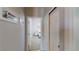 Hallway view leading to a bedroom, showcasing neutral walls and white trim at 2713 Tanagrine Dr, North Las Vegas, NV 89084