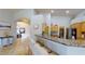 Kitchen view from the living area shows counter seating and access to the pantry at 2713 Tanagrine Dr, North Las Vegas, NV 89084