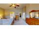 Spacious primary bedroom boasts an ensuite bathroom, walk-in closet, and large windows at 2713 Tanagrine Dr, North Las Vegas, NV 89084