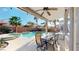 Inviting covered patio overlooks a sparkling pool and spa, perfect for outdoor gatherings and relaxation at 2713 Tanagrine Dr, North Las Vegas, NV 89084