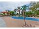 Community splash pad provides a fun and interactive water play area with palm trees and shaded seating for families at 2713 Tanagrine Dr, North Las Vegas, NV 89084