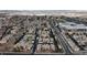 An aerial view showcasing the community, nearby homes, and the cityscape in the distance at 2900 Sunridge Heights Pkwy # 1916, Henderson, NV 89052