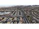Aerial view of a residential area, featuring nearby shopping centers, neatly arranged housing and local roads at 2900 Sunridge Heights Pkwy # 1916, Henderson, NV 89052