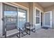 Relaxing balcony features comfortable seating and views of the building exterior at 2900 Sunridge Heights Pkwy # 1916, Henderson, NV 89052