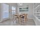 Bright dining area with a sliding glass door and sleek modern lighting at 2900 Sunridge Heights Pkwy # 1916, Henderson, NV 89052