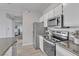 Modern kitchen view with stainless steel appliances and granite countertops, adjacent to the bedroom at 2900 Sunridge Heights Pkwy # 1916, Henderson, NV 89052