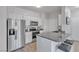Well-lit kitchen featuring stainless steel appliances, granite countertops, and ample cabinet space at 2900 Sunridge Heights Pkwy # 1916, Henderson, NV 89052