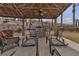 Relaxing poolside lounge area features an outdoor kitchen with stainless steel grill at 2900 Sunridge Heights Pkwy # 1916, Henderson, NV 89052