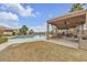An inviting community pool area with comfortable seating and an outdoor kitchen at 2900 Sunridge Heights Pkwy # 1916, Henderson, NV 89052