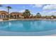 Resort-style pool featuring palm trees and elegant landscaping offers a tranquil escape at 2900 Sunridge Heights Pkwy # 1916, Henderson, NV 89052