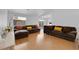 Bright living room features hardwood floors, neutral walls, and comfortable seating with natural light at 3102 Honeysuckle Ave, North Las Vegas, NV 89031