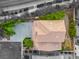 A bird's eye view shows the home's roofline, large driveway, and mature landscaping, highlighting curb appeal and meticulous maintenance at 3273 Alcudia Bay Ave, Las Vegas, NV 89141