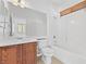 Well-lit bathroom featuring a vanity with drawers, a large mirror, and a shower/tub combo at 3273 Alcudia Bay Ave, Las Vegas, NV 89141