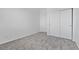 Carpeted bedroom features closet and neutral paint at 3273 Alcudia Bay Ave, Las Vegas, NV 89141