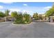 Gated entry to the San Niccolo community with stone pillars and black iron gates, ensuring privacy and security at 3273 Alcudia Bay Ave, Las Vegas, NV 89141