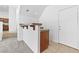 Hallway with a granite counter and a white door with tile flooring, offering a clean transition at 3273 Alcudia Bay Ave, Las Vegas, NV 89141