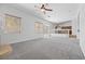 Spacious living room with abundant natural light and neutral tones throughout at 3273 Alcudia Bay Ave, Las Vegas, NV 89141