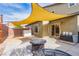 Spacious backyard with patio, awning, and room for outdoor activities and relaxing at 3728 Juanita May Ave, North Las Vegas, NV 89032