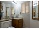 Bathroom featuring a single sink, a large mirror, and nautical decor at 3728 Juanita May Ave, North Las Vegas, NV 89032