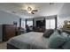 Spacious bedroom has neutral-toned walls, wood-look floors and large windows for ample natural light at 3728 Juanita May Ave, North Las Vegas, NV 89032