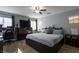 Comfortable bedroom features neutral walls, wood-look floors, and an inviting queen-size bed at 3728 Juanita May Ave, North Las Vegas, NV 89032