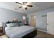 The bedroom features modern light fixtures and a ceiling fan for climate control at 3728 Juanita May Ave, North Las Vegas, NV 89032