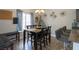 Cozy dining area with a table for six, stylish decor, and ample natural light at 3728 Juanita May Ave, North Las Vegas, NV 89032