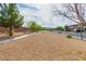 Community park offers a scenic walking path and a bench to enjoy the outdoors at 3728 Juanita May Ave, North Las Vegas, NV 89032