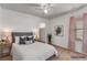 Relaxing bedroom with neutral decor, soft bedding, and warm lighting at 3821 E Summit Ave, Pahrump, NV 89061