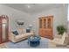 Cozy living room with comfortable seating, charming decor, and warm lighting at 3821 E Summit Ave, Pahrump, NV 89061