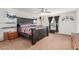 Spacious bedroom with large bed, ceiling fan, and neutral color palette providing a relaxing atmosphere at 3821 E Summit Ave, Pahrump, NV 89061