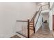 Carpeted staircase with white railing leads to the second floor at 3821 E Summit Ave, Pahrump, NV 89061