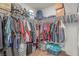 Walk-in closet featuring organized shelving and hanging space, maximizing storage at 3821 E Summit Ave, Pahrump, NV 89061