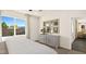 Bright bedroom featuring large windows, modern decor, and a calming atmosphere at 4140 E Brusca Way, Pahrump, NV 89061