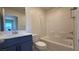 Clean bathroom with tiled shower-tub, modern vanity, and updated fixtures at 4705 Parkarbor Ave, Las Vegas, NV 89141