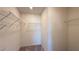 Walk-in closet with carpet flooring, shelving racks, and neutral walls throughout at 4705 Parkarbor Ave, Las Vegas, NV 89141