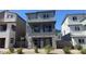 Charming two-story home with stone accents and manicured landscaping in a modern community at 4705 Parkarbor Ave, Las Vegas, NV 89141