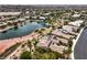 Desert home featuring a pond, solar panels, desert landscaping and mountain views at 5162 Estasi St, Las Vegas, NV 89135