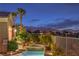 The pool and spa features mature trees and mountain views in this backyard oasis at 5162 Estasi St, Las Vegas, NV 89135