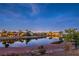 Scenic backyard view of a serene lake, perfect for enjoying nature and tranquility at 5162 Estasi St, Las Vegas, NV 89135