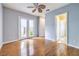 Bright bedroom with hardwood floors, french doors, and plenty of natural light at 5162 Estasi St, Las Vegas, NV 89135