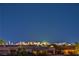 Cityscape view overlooking rooftops and the shimmering lights of the cityscape at 5162 Estasi St, Las Vegas, NV 89135