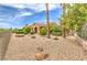 Exterior of the home showing mature trees and gravel landscaping at 5162 Estasi St, Las Vegas, NV 89135