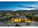 Inviting desert home with a pool, mature landscaping, and mountain views, perfect for outdoor relaxation and scenic enjoyment at 5162 Estasi St, Las Vegas, NV 89135
