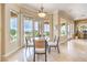 Breakfast nook features large glass doors overlooking the backyard at 5162 Estasi St, Las Vegas, NV 89135