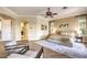 Spacious main bedroom with natural light, elegant furnishings, and hardwood floors at 5162 Estasi St, Las Vegas, NV 89135