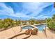 Beautiful pool and spa with rock features, overlooking a serene view at 5162 Estasi St, Las Vegas, NV 89135